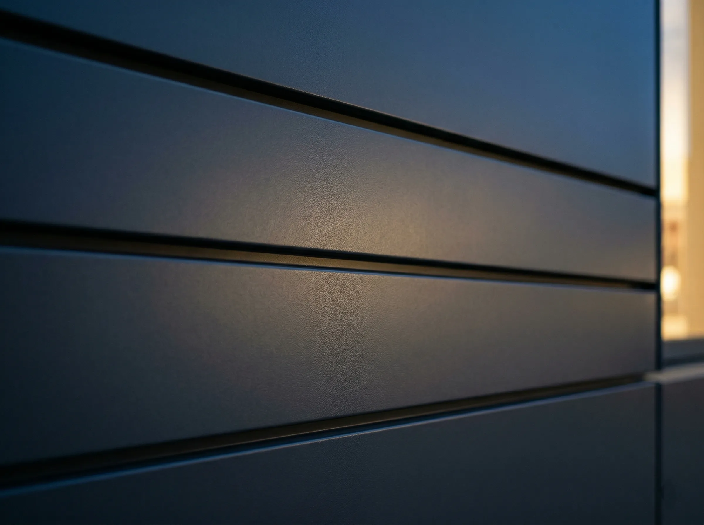 Dark charcoal aluminum siding panel texture