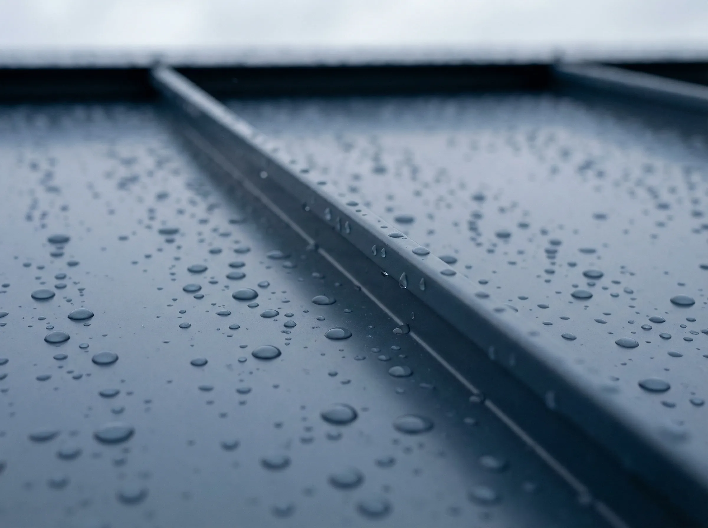 Prepainted aluminum roofing panels with water droplets